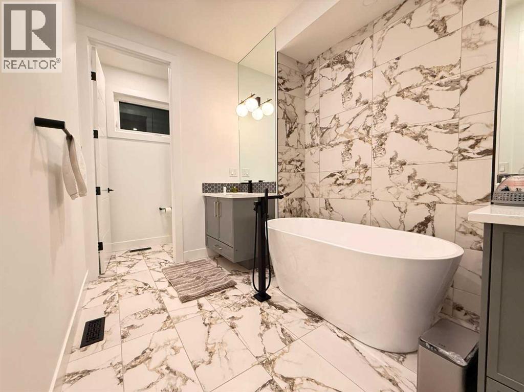 103 Hartford Road NW, Calgary, Alberta  T2K 2A7 - Photo 15 - A2282978