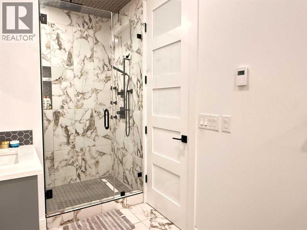 103 Hartford Road NW, Calgary, Alberta  T2K 2A7 - Photo 16 - A2282978