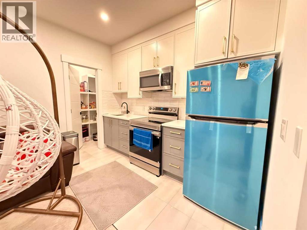 103 Hartford Road NW, Calgary, Alberta  T2K 2A7 - Photo 19 - A2282978