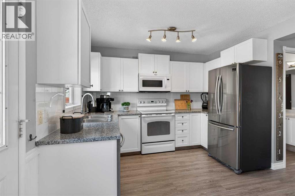 14744 Mt Mckenzie Drive SE, Calgary, Alberta  T2Z 2V1 - Photo 11 - A2303004