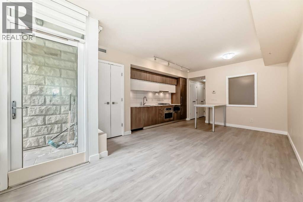 110, 51 Waterfront Mews Sw, Calgary, Alberta  T2P 0X3 - Photo 12 - A2300672