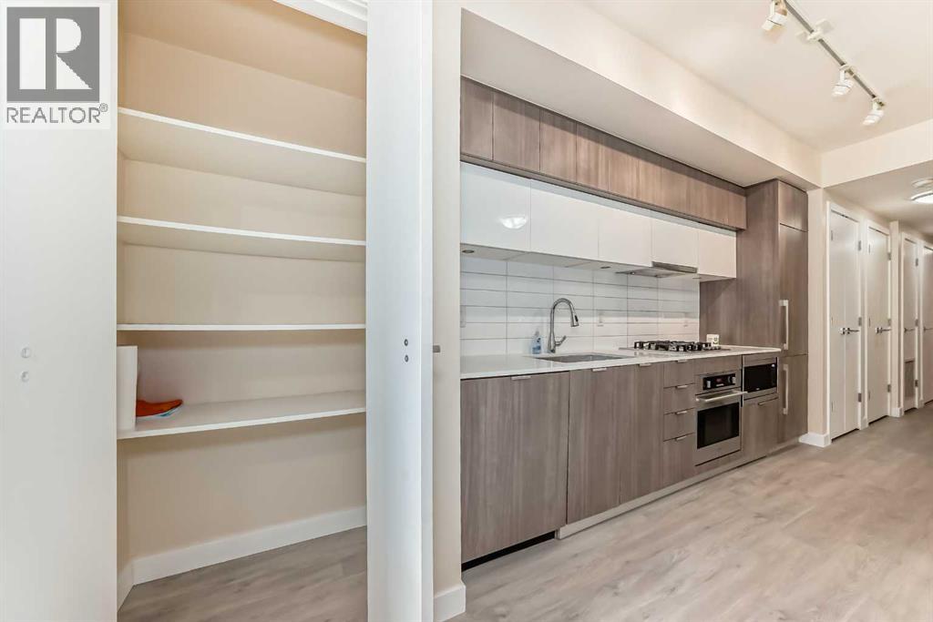 110, 51 Waterfront Mews Sw, Calgary, Alberta  T2P 0X3 - Photo 18 - A2300672