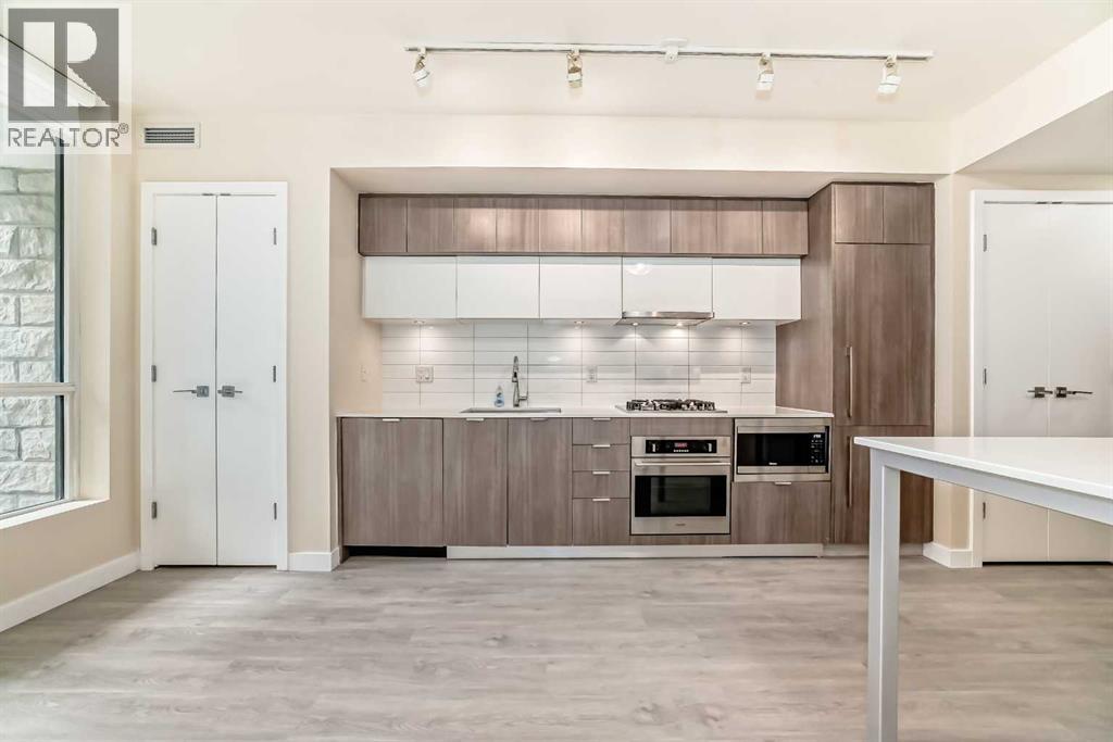 110, 51 Waterfront Mews Sw, Calgary, Alberta  T2P 0X3 - Photo 6 - A2300672