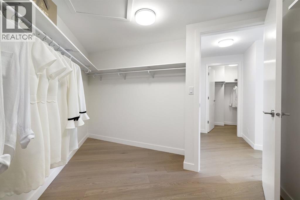 102, 88 Waterfront Mews SW, Calgary, Alberta  T2P 1K7 - Photo 28 - A2251109