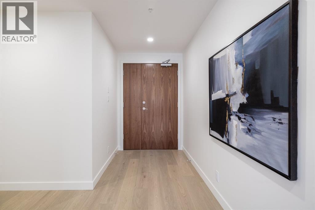 102, 88 Waterfront Mews SW, Calgary, Alberta  T2P 1K7 - Photo 5 - A2251109
