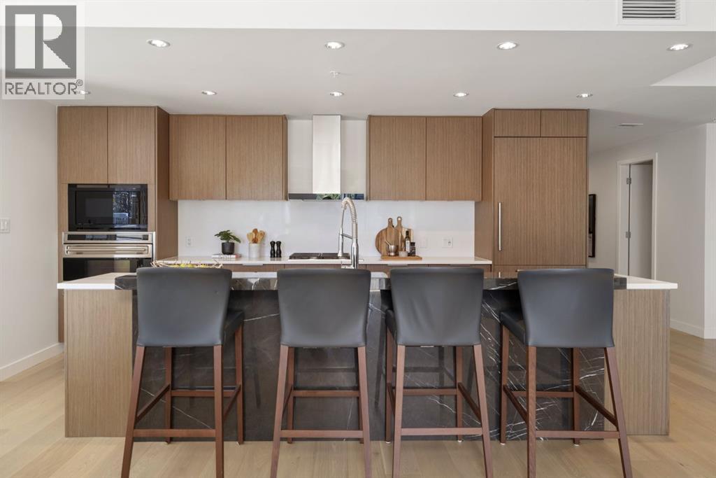 102, 88 Waterfront Mews SW, Calgary, Alberta  T2P 1K7 - Photo 15 - A2251109