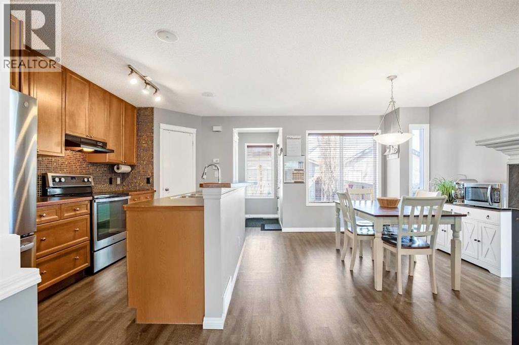 106 Tuscany Springs Heights Nw, Calgary, Alberta  T3L 2X9 - Photo 7 - A2304878