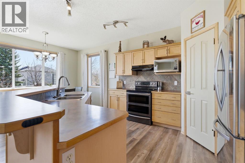 159 Milligan Drive, Okotoks, Alberta  T1S 1N2 - Photo 7 - A2302254