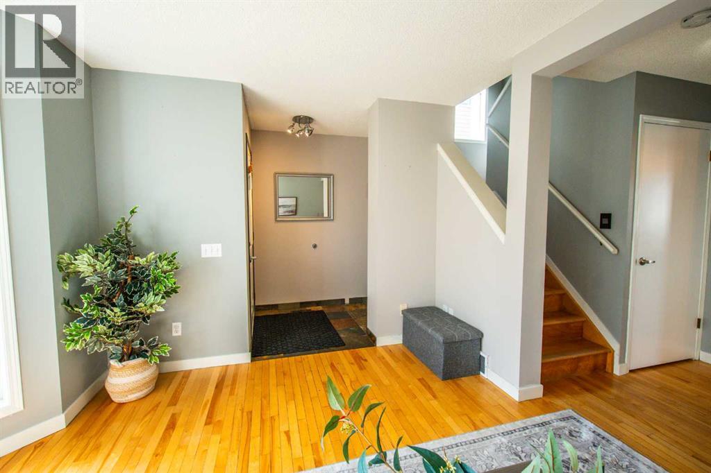 84 Hidden Green Nw, Calgary, Alberta  T3A 5K7 - Photo 4 - A2296267