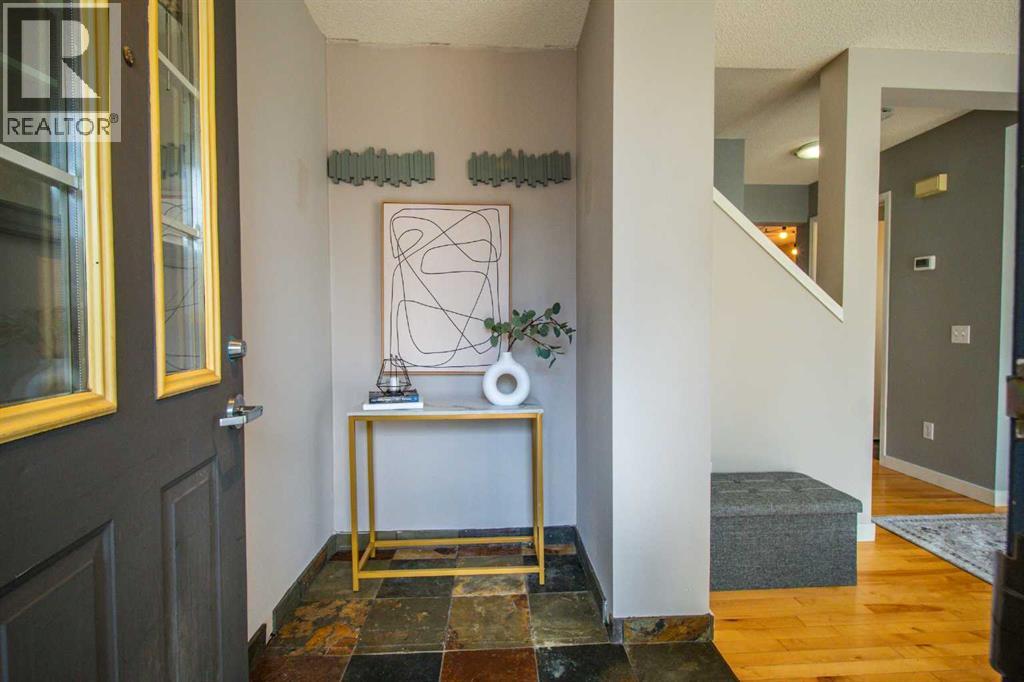 84 Hidden Green Nw, Calgary, Alberta  T3A 5K7 - Photo 3 - A2296267