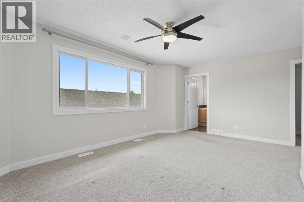 108 Drake Landing Court, Okotoks, Alberta  T1S 2M3 - Photo 24 - A2304866