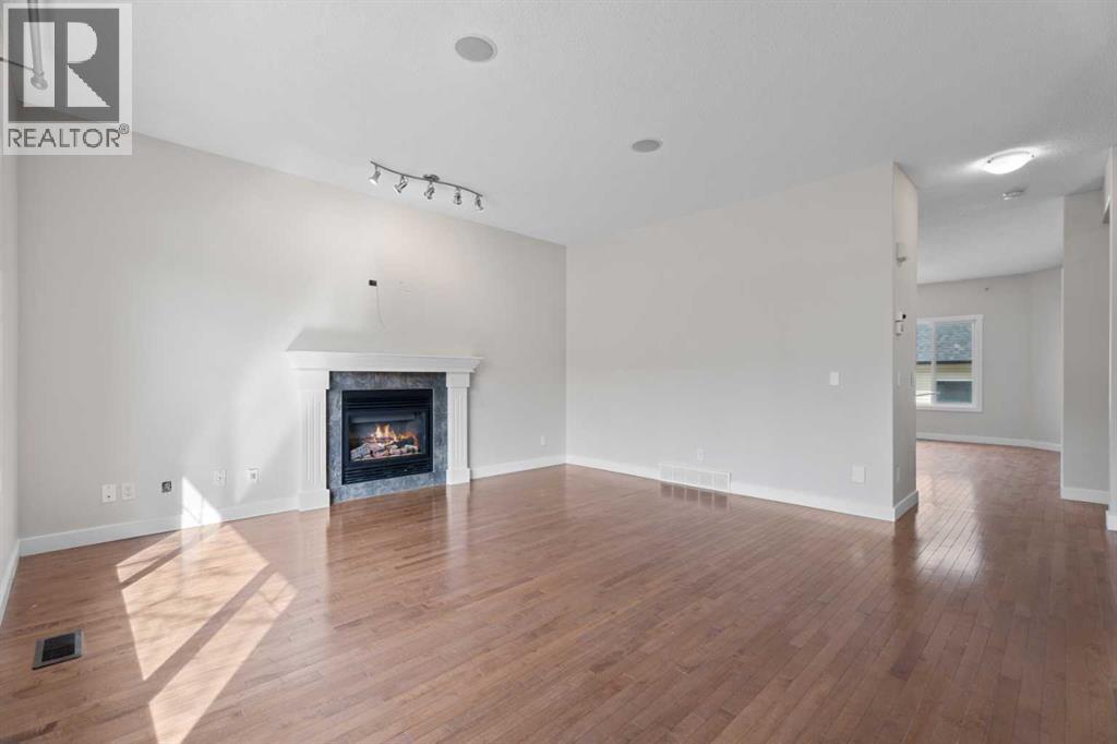 108 Drake Landing Court, Okotoks, Alberta  T1S 2M3 - Photo 7 - A2304866