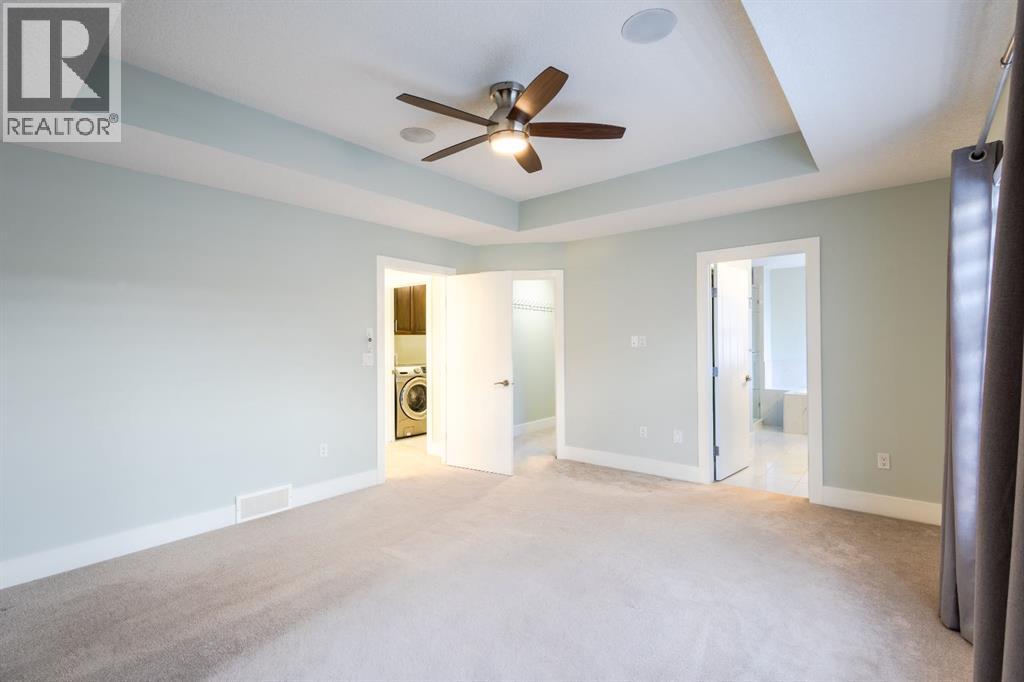 148 Baysprings Court SW, Airdrie, Alberta  T4B 3X7 - Photo 14 - A2299469