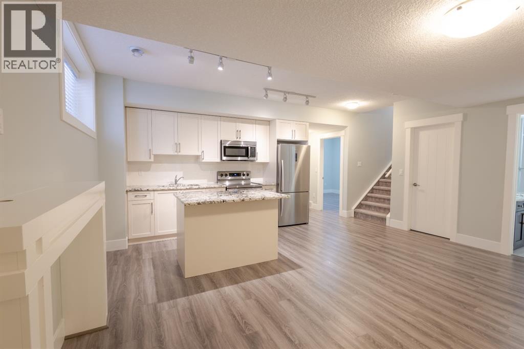 148 Baysprings Court SW, Airdrie, Alberta  T4B 3X7 - Photo 25 - A2299469