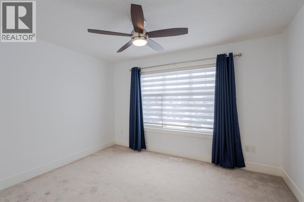 148 Baysprings Court SW, Airdrie, Alberta  T4B 3X7 - Photo 17 - A2299469