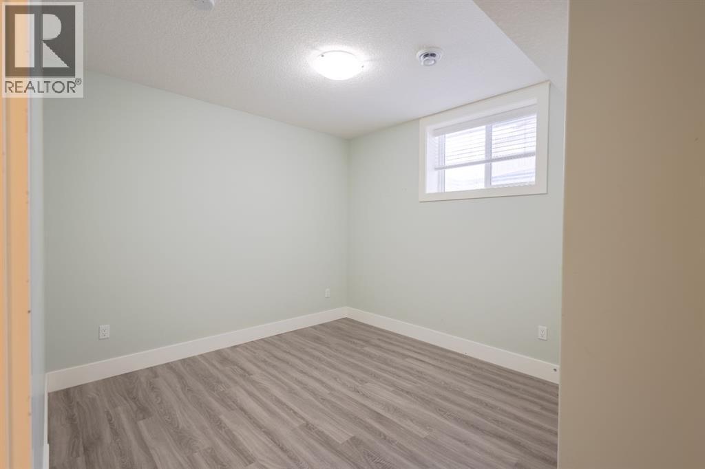 148 Baysprings Court SW, Airdrie, Alberta  T4B 3X7 - Photo 29 - A2299469