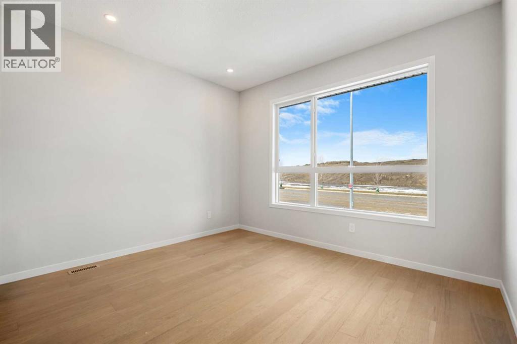 213 Bridgeport Gate, Chestermere, Alberta  T1X 3E2 - Photo 4 - A2300235