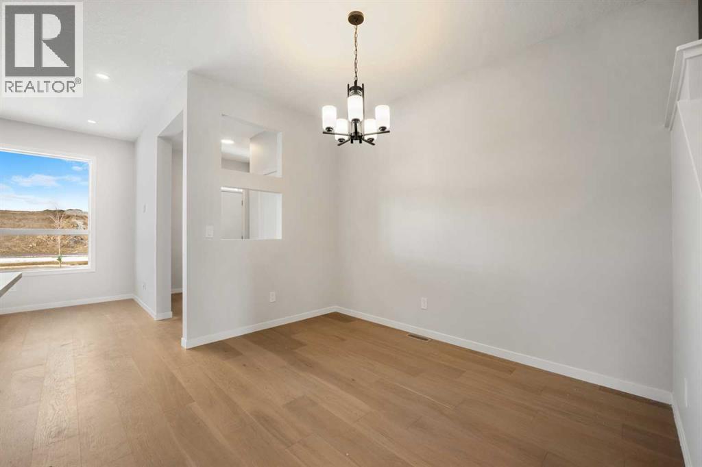 213 Bridgeport Gate, Chestermere, Alberta  T1X 3E2 - Photo 7 - A2300235