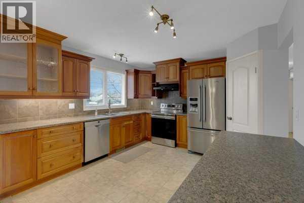 3 Madigan Court NE, Calgary, Alberta  T2A 5C7 - Photo 10 - A2294506