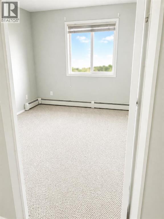 1406, 505 Railway Street W, Cochrane, Alberta  T4C 2K9 - Photo 10 - A2303842