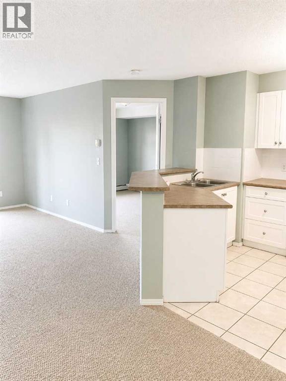 1406, 505 Railway Street W, Cochrane, Alberta  T4C 2K9 - Photo 5 - A2303842