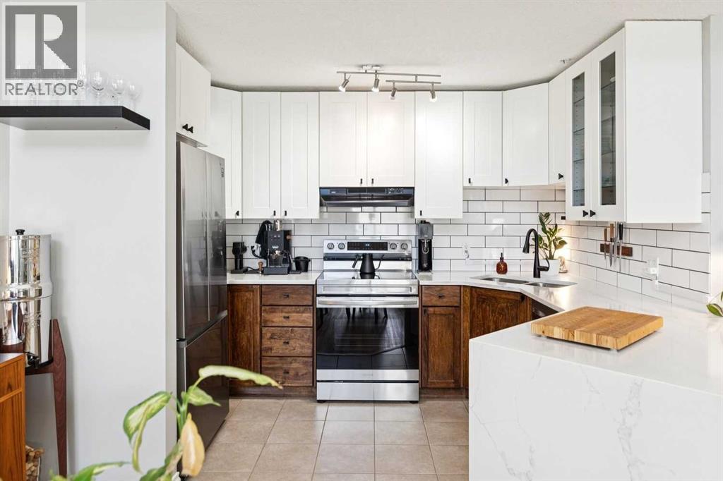 406, 1631 28 Avenue SW, Calgary, Alberta  T2T 1J5 - Photo 3 - A2304487