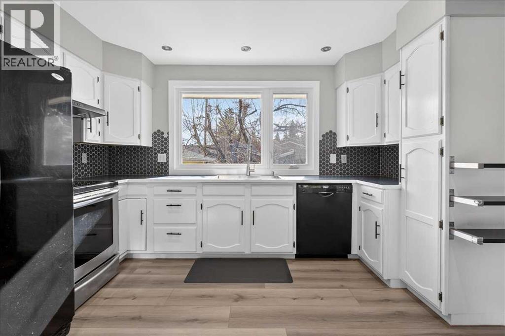 611 Lake Linnet Crescent SE, Calgary, Alberta  T2J 2J3 - Photo 8 - A2303802