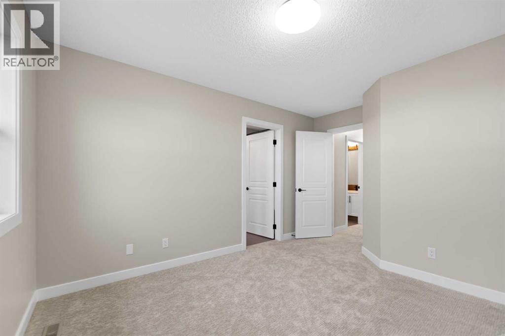 53 Panatella Road NW, Calgary, Alberta  T3K 0S7 - Photo 23 - A2302945