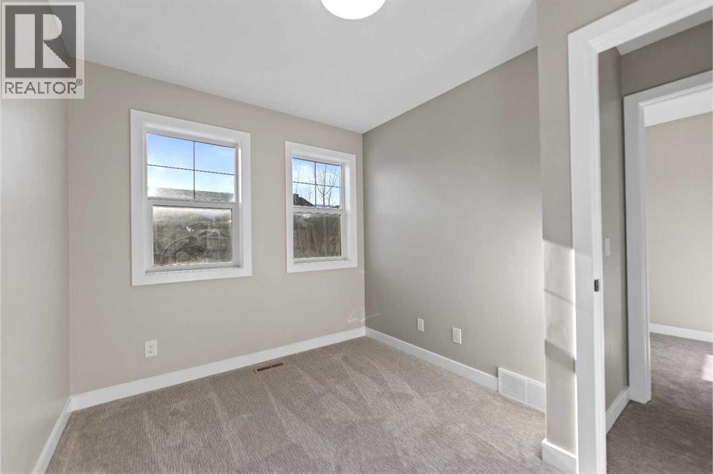 53 Panatella Road NW, Calgary, Alberta  T3K 0S7 - Photo 21 - A2302945