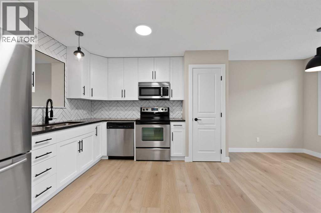 53 Panatella Road NW, Calgary, Alberta  T3K 0S7 - Photo 11 - A2302945