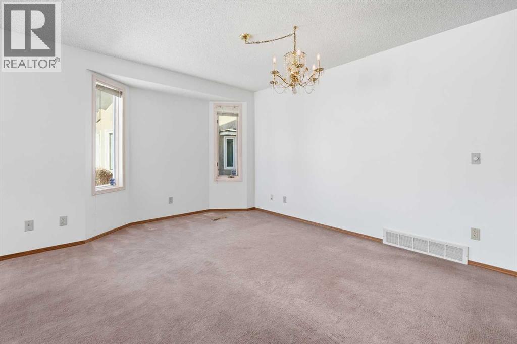 12 Arbour Cliff Close NW, Calgary, Alberta  T3G 3W8 - Photo 5 - A2276284