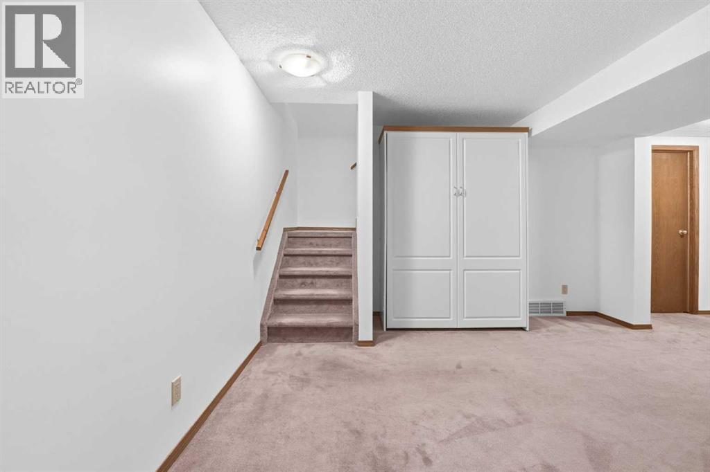 12 Arbour Cliff Close NW, Calgary, Alberta  T3G 3W8 - Photo 20 - A2276284