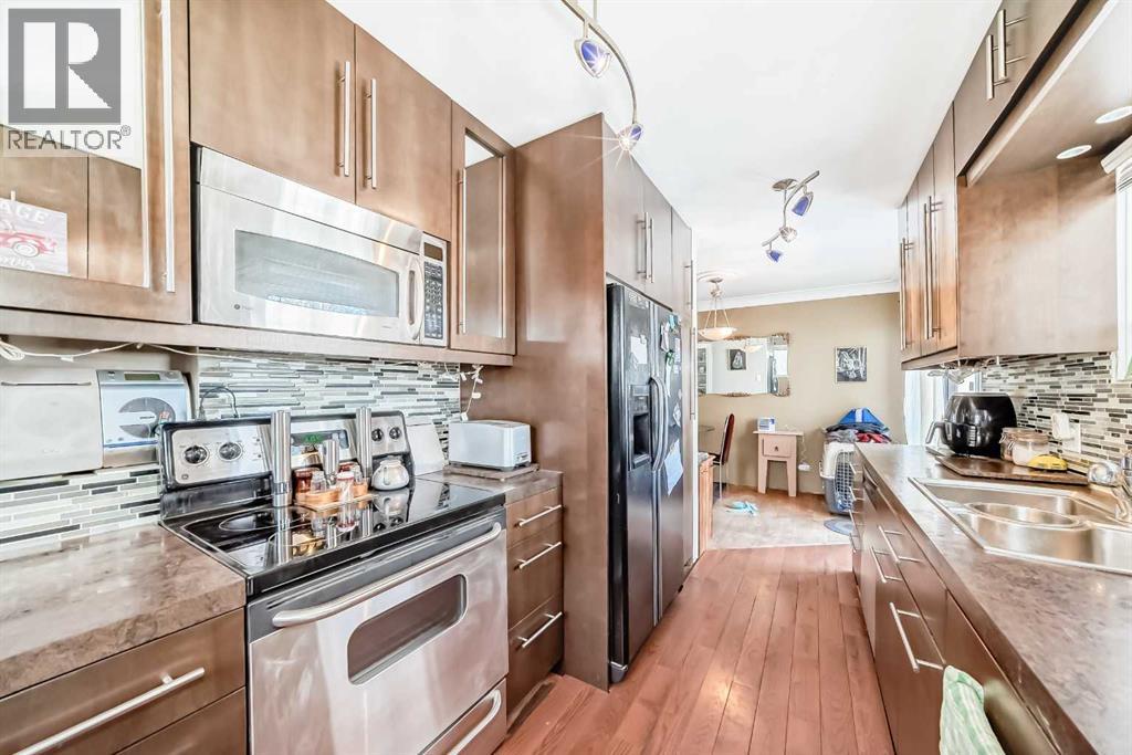 440 36 Avenue NW, Calgary, Alberta  T2K 0C3 - Photo 3 - A2299648