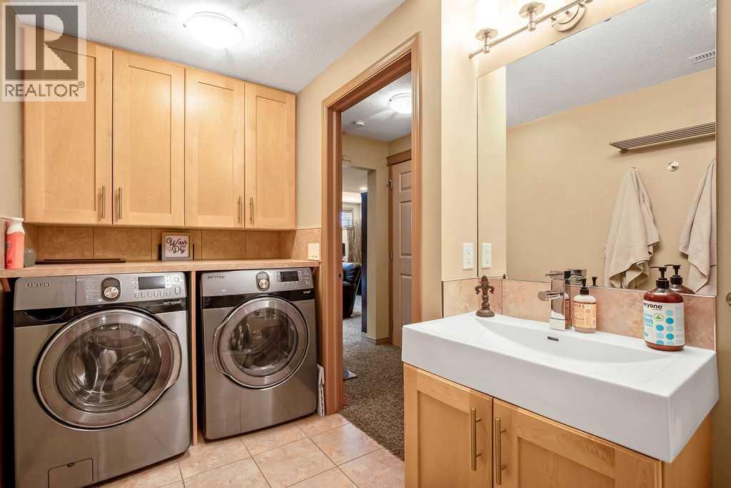 49 Spring Meadows Bay, Okotoks, Alberta  T1S 2G8 - Photo 22 - A2302953