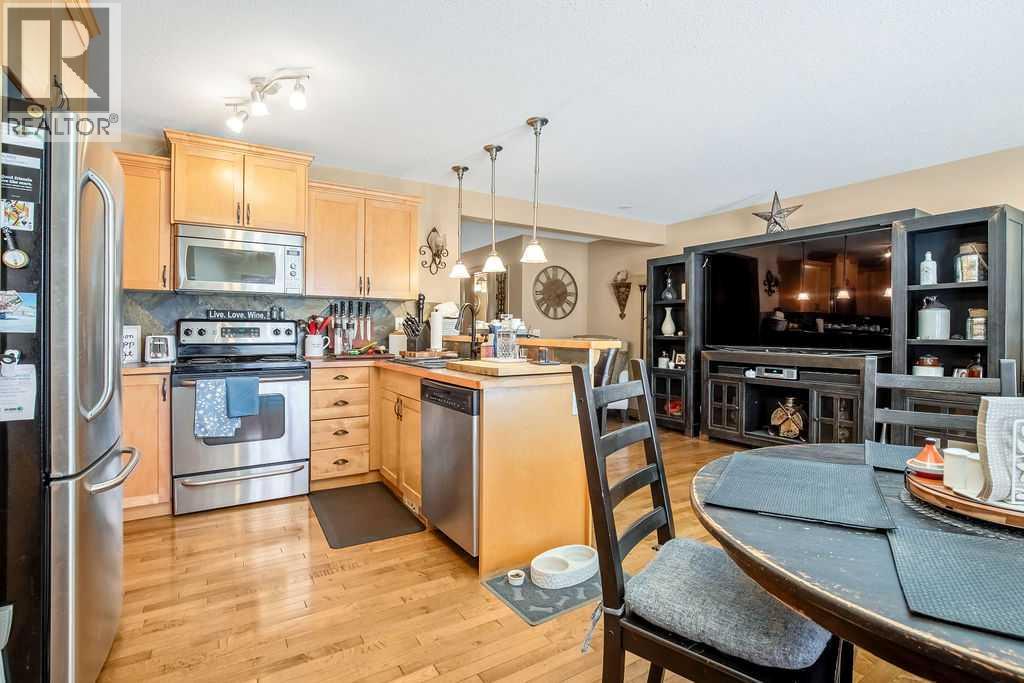 49 Spring Meadows Bay, Okotoks, Alberta  T1S 2G8 - Photo 8 - A2302953