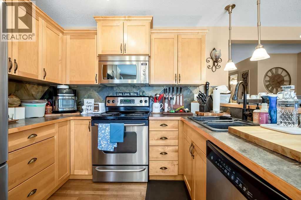 49 Spring Meadows Bay, Okotoks, Alberta  T1S 2G8 - Photo 9 - A2302953