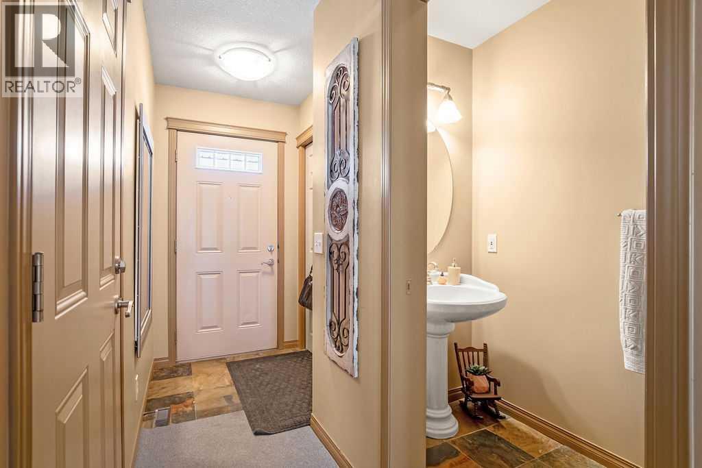 49 Spring Meadows Bay, Okotoks, Alberta  T1S 2G8 - Photo 2 - A2302953