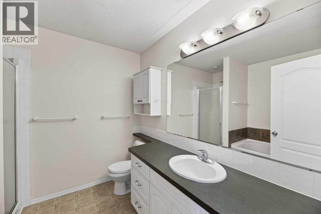 211 200 Carriage Lane Place, Carstairs, Alberta  T0M 0N0 - Photo 18 - A2303309