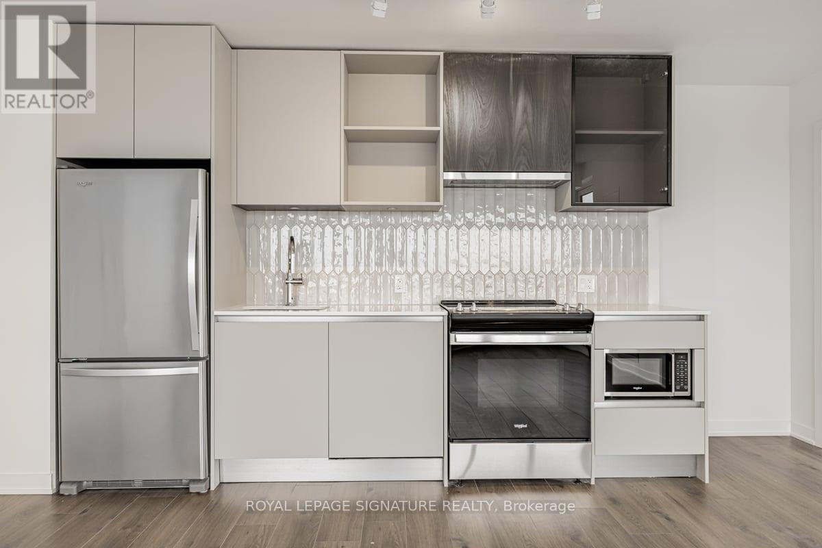 429 - 395 Dundas Street W, Oakville, Ontario  L6M 4M2 - Photo 4 - W12928126