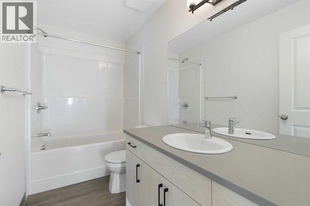 404, 24 Rivercrest Drive, Cochrane, Alberta  T4C 2C5 - Photo 20 - A2292815