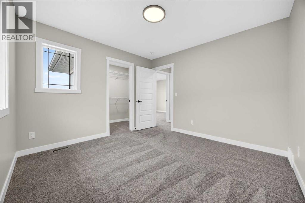 218 Bayview Park SW, Airdrie, Alberta  T4B 3B1 - Photo 38 - A2298006