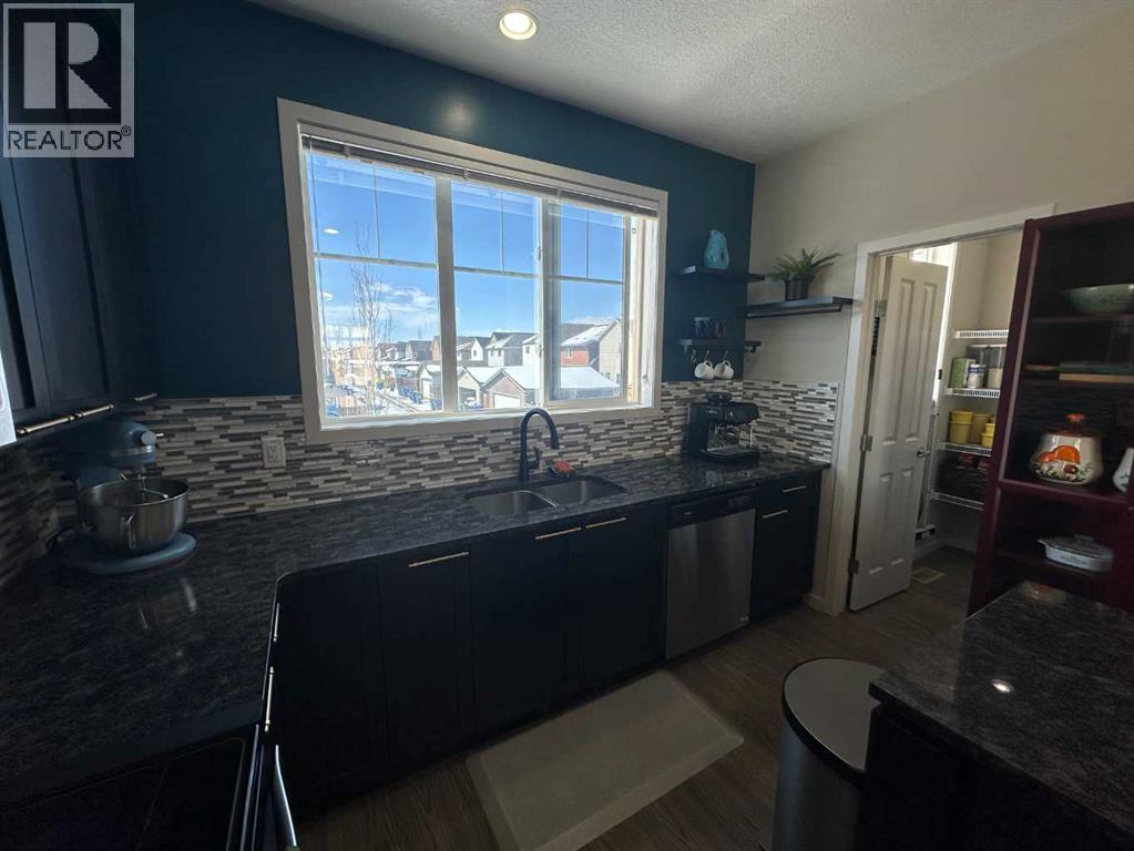 113 Copperpond Row Se, Calgary, Alberta  T2Z 1H3 - Photo 7 - A2302891