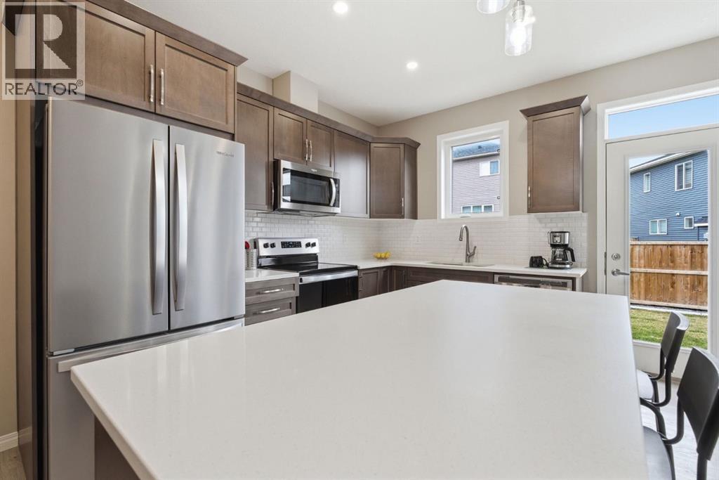 22 Carrington Crescent Nw, Calgary, Alberta  T3P 1N6 - Photo 7 - A2304863