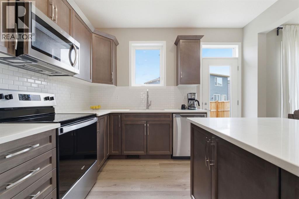 22 Carrington Crescent Nw, Calgary, Alberta  T3P 1N6 - Photo 5 - A2304863