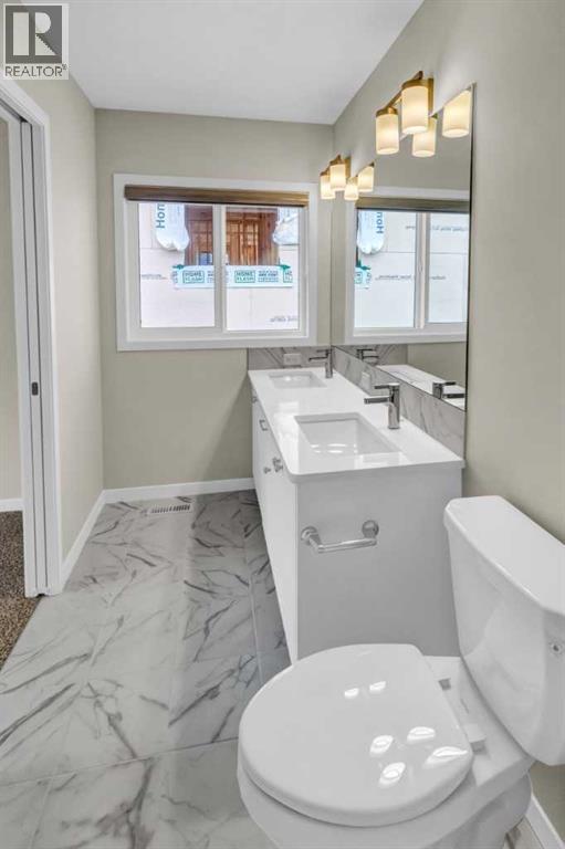 249 Aquila Drive Nw, Calgary, Alberta  T3R 1Y6 - Photo 9 - A2298108