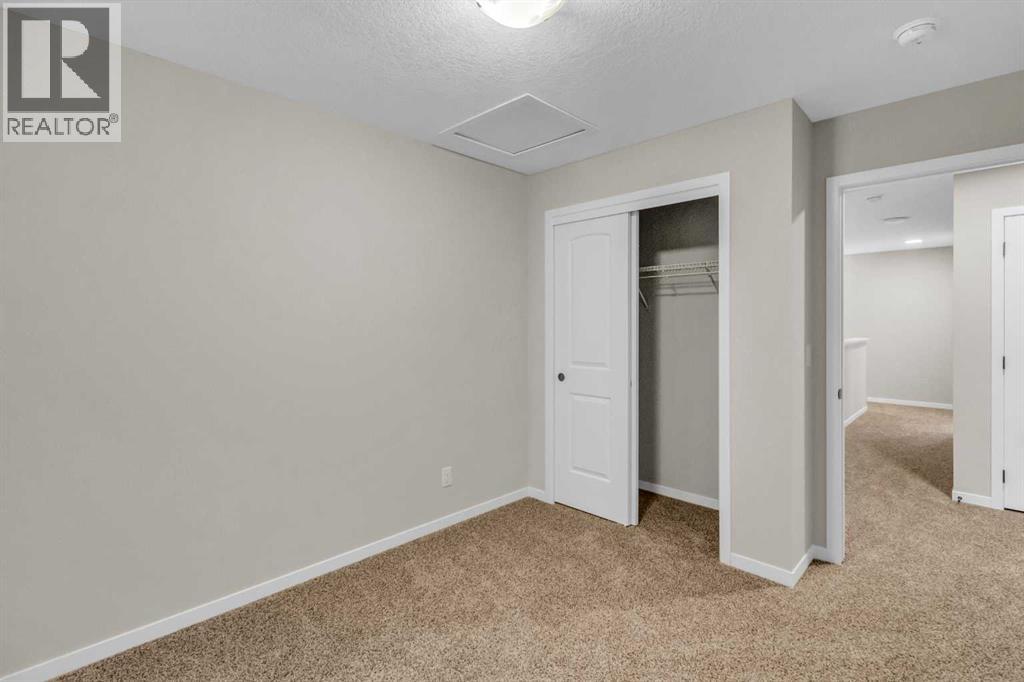 249 Aquila Drive Nw, Calgary, Alberta  T3R 1Y6 - Photo 14 - A2298108