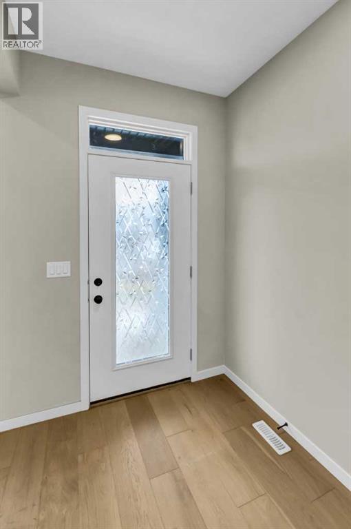 249 Aquila Drive Nw, Calgary, Alberta  T3R 1Y6 - Photo 4 - A2298108