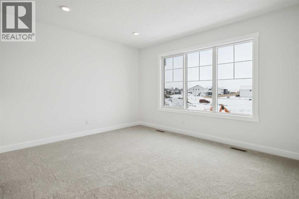 214 Harmony Circle, Rural Rocky View County, Alberta  T3Z 0K9 - Photo 27 - A2291912