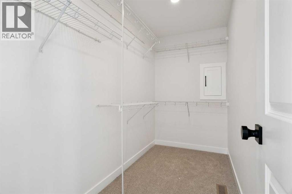 214 Harmony Circle, Rural Rocky View County, Alberta  T3Z 0K9 - Photo 37 - A2291912