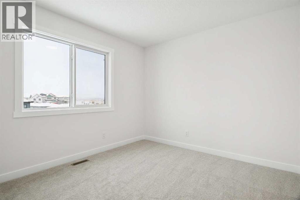 214 Harmony Circle, Rural Rocky View County, Alberta  T3Z 0K9 - Photo 39 - A2291912